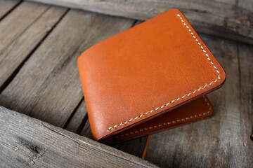 leather wallet on a wooden background