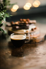 espresso and chocolate bars on a Board with nuts