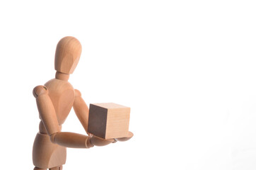 Wooden figure mannequin posing in action isolated on white background.