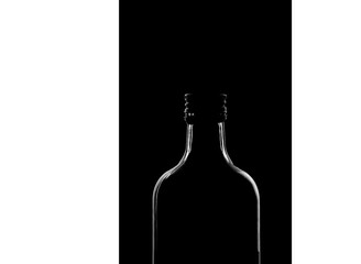 half a bottle on a black background. Only the silhouette is visible. Place for text. Copy space