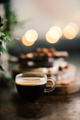 espresso and chocolate bars on a Board with nuts