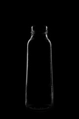 Silhouette of a bottle with a beautiful shape on a black background