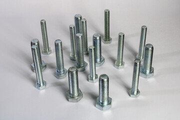 Steel bolts on a white background