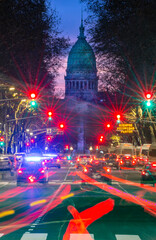 Argentina Parliament palace at dusk, with avenue and car light traces with semaphores, on a long...