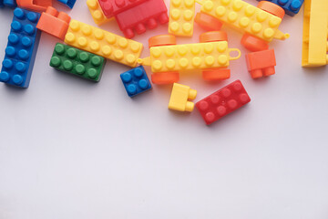 colorful building blocks with copy space on white 