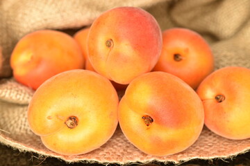 Ripe sweet, organic apricots, close-up, on a white background.