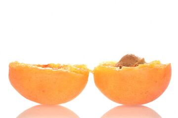 Ripe sweet, organic apricots, close-up, on a white background.