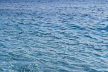 Caribbean sea surface summer wave background. Exotic water landscape with clouds on horizon. Natural tropical water paradise. Cuba nature relax. Travel tropical island resort. Ocean nature tranquility