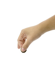 hand of a person holding a money coin with copy space. Isolated on white background with clipping path.