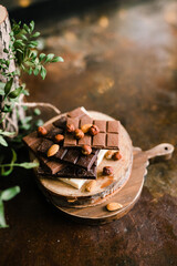 chocolate bars on a Board with nuts