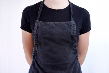 young woman with dar apron