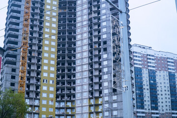 Modern new multi-storey building under construction in the city
