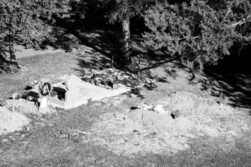 Black and white New grave earth soil mud muslim cemetery tomb