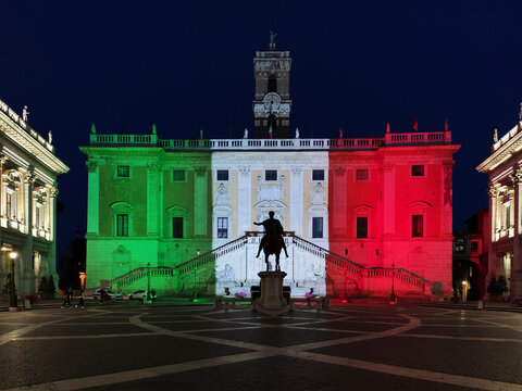 Campidoglio in Rome at night with italian flag