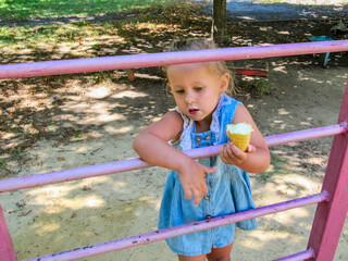 Little girl  eating ice cream