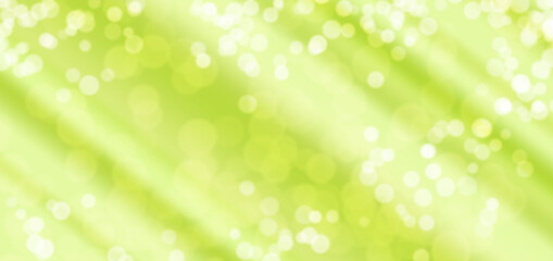 Fototapeta na wymiar Glowing light on green background