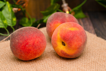 Fresh peaches on the garden table