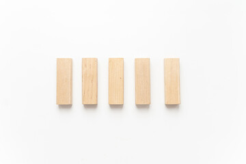 wooden bars lie on a light background