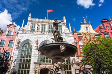 Fountain of the Neptune with face mask in old town of Gdansk, Poland © Patryk Kosmider