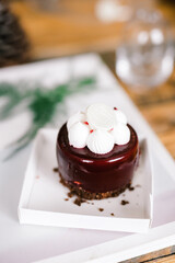 raspberry mousse cake on a wooden table