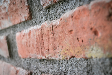 An old brick wall closeup  showing its texture