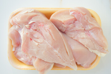 Chicken fillet and meat for a healthy diet. Cooking diet meat, concept of slimming and gaining muscle mass