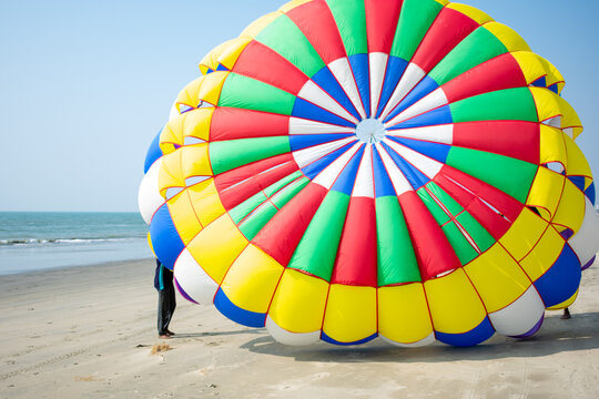 Parasailing in the blue sky of Cox's Bazar