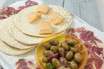 Buffet with olive  cheese and salame