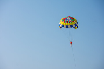 Parasailing in the blue sky of Cox's Bazar