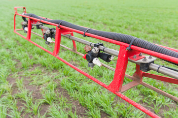 Close up liquid valve at sprayer boom © o_lypa