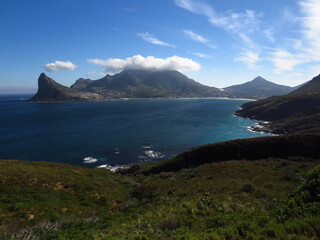 A view of Hout Bay and the surrounding mountains and ocean near Cape Town, South Africa.