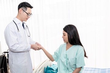 The doctor pressed his finger on the palm of the patient In order to alieve pain And make patients feel relaxed, On white background to people and health care concept.