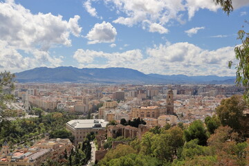 Fototapeta na wymiar Malaga, Spain - April 05 2019 Horizontal View of Malaga's Panorama, Taken From Viewpoint at Castillo de Gibralfaro in Malaga, Spain