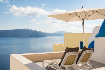 View from a balcony in Oia village, Santorini island, Greece. Balcony overlooks caldera and the...