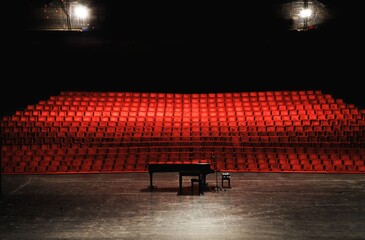 Fototapeta Empty concert hall or theater seats and piano on stage obraz