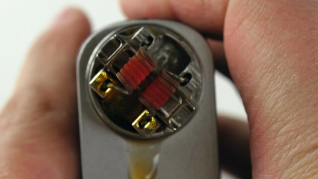 Vaping atomizer with clapton coil is working.