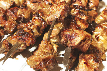 Grilled kebab. Roasted meat with onions. Background from food. Pork