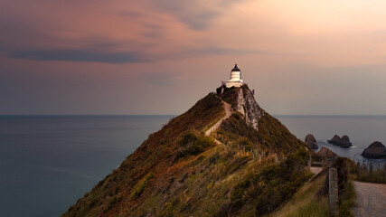 Fototapeta na wymiar Nugget Point Lighthouse Neuseeland bei Kaka Point
