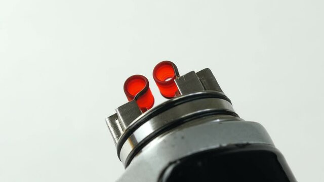 Vaping atomizer with clapton coil is working.