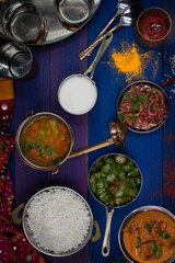 South Indian vegetarian food consisting of rice and side dishes served in traditional pots