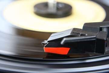 Black record player with vinyl record