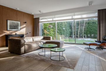 Elegant living room with window wall