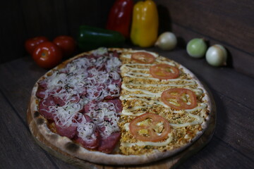 pizza with salami and tomatoes