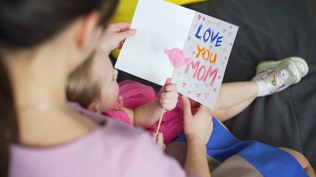 Mother and Daughter Viewing Greeting Card