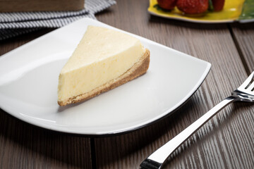 delicious slice of cheesecake on a plate