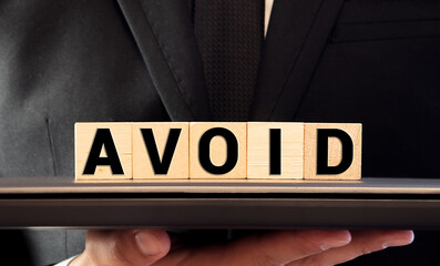 Wooden Blocks with the text - Avoid