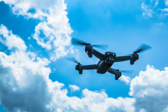 Drone flying in sky