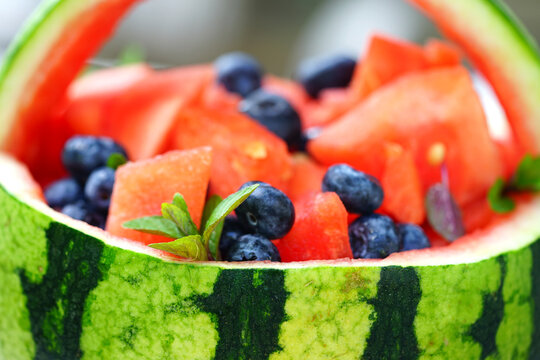 Watermelon and blueberry salad in a watermelon basket