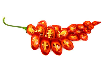 Sliced red hot chili peppers on a white background