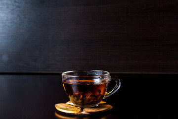 tea with lemon in a transparent glass cup